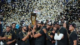 Dec 16, 2025; Las Vegas, Nevada, USA; New York Knicks center/forward Karl-Anthony Towns (32) and guard Jalen Brunson (11) hold the the Emirates NBA Cup trophy after victory over the San Antonio Spurs at T-Mobile Arena. Mandatory Credit: Kirby Lee-Imagn Images