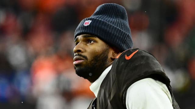 Cleveland Browns quarterback Shedeur Sanders (12) watches from the sidelines late in the fourth quarter against the Tennessee Titans at Huntington Bank Field.