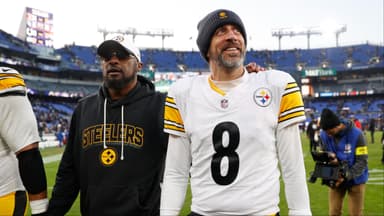 Pittsburgh Steelers head coach Mike Tomlin and quarterback Aaron Rodgers (8) walk off the field after the game against the Baltimore Ravens at M&T Bank Stadium.