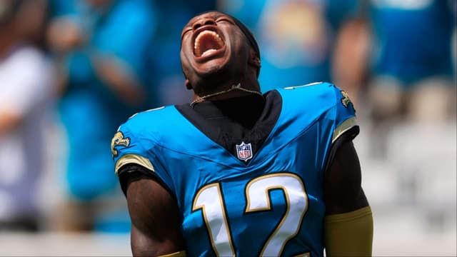 Jacksonville Jaguars wide receiver Travis Hunter (12) yells as his is introduced before an NFL football matchup at EverBank Stadium, Sunday, Sept. 21, 2025, in Jacksonville, Fla. The Jaguars defeated the Texans 17-10.