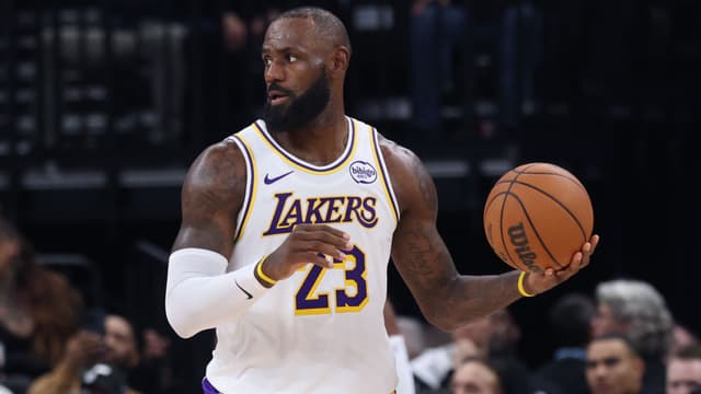Nov 23, 2025; Salt Lake City, Utah, USA; Los Angeles Lakers forward LeBron James (23) looks for the play against the Utah Jazz during the second half at Delta Center