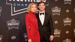 Nov 22, 2024; Charlotte, NC, USA; NASCAR Cup Series driver Daniel Suarez and wife Julia Piquet during the NASCAR Awards Banquet at Charlotte Convention Center.