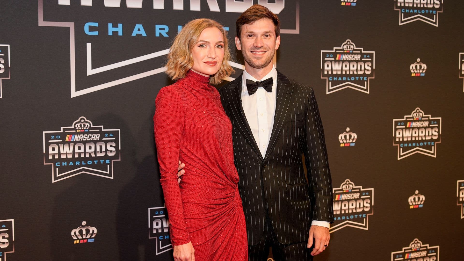 Nov 22, 2024; Charlotte, NC, USA; NASCAR Cup Series driver Daniel Suarez and wife Julia Piquet during the NASCAR Awards Banquet at Charlotte Convention Center.