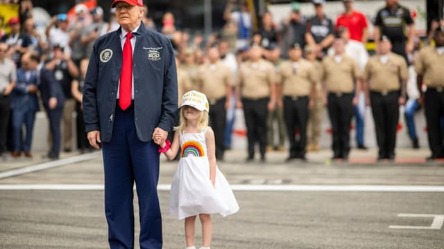 February 16, 2025, Daytona, Fl, United States: U.S President Donald Trump, accompanied by his granddaughter Carolina Trump, arrives to attend the NASCAR Daytona 500 race at Daytona International Speedway, February 16, 2025 in Daytona Beach, Florida