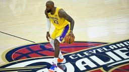 Jan 28, 2026; Cleveland, Ohio, USA; Los Angeles Lakers forward LeBron James (23) brings the ball up court in the fourth quarter against the Cleveland Cavaliers at Rocket Arena.