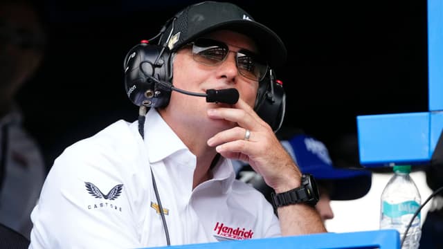 Hendrick Motorsports' Jeff Gordon watches the restart from the pit of NASCAR Cup Series driver Kyle Larson (5) Sunday, July 27, 2025, during the Brickyard 400 at Indianapolis Motor Speedway.