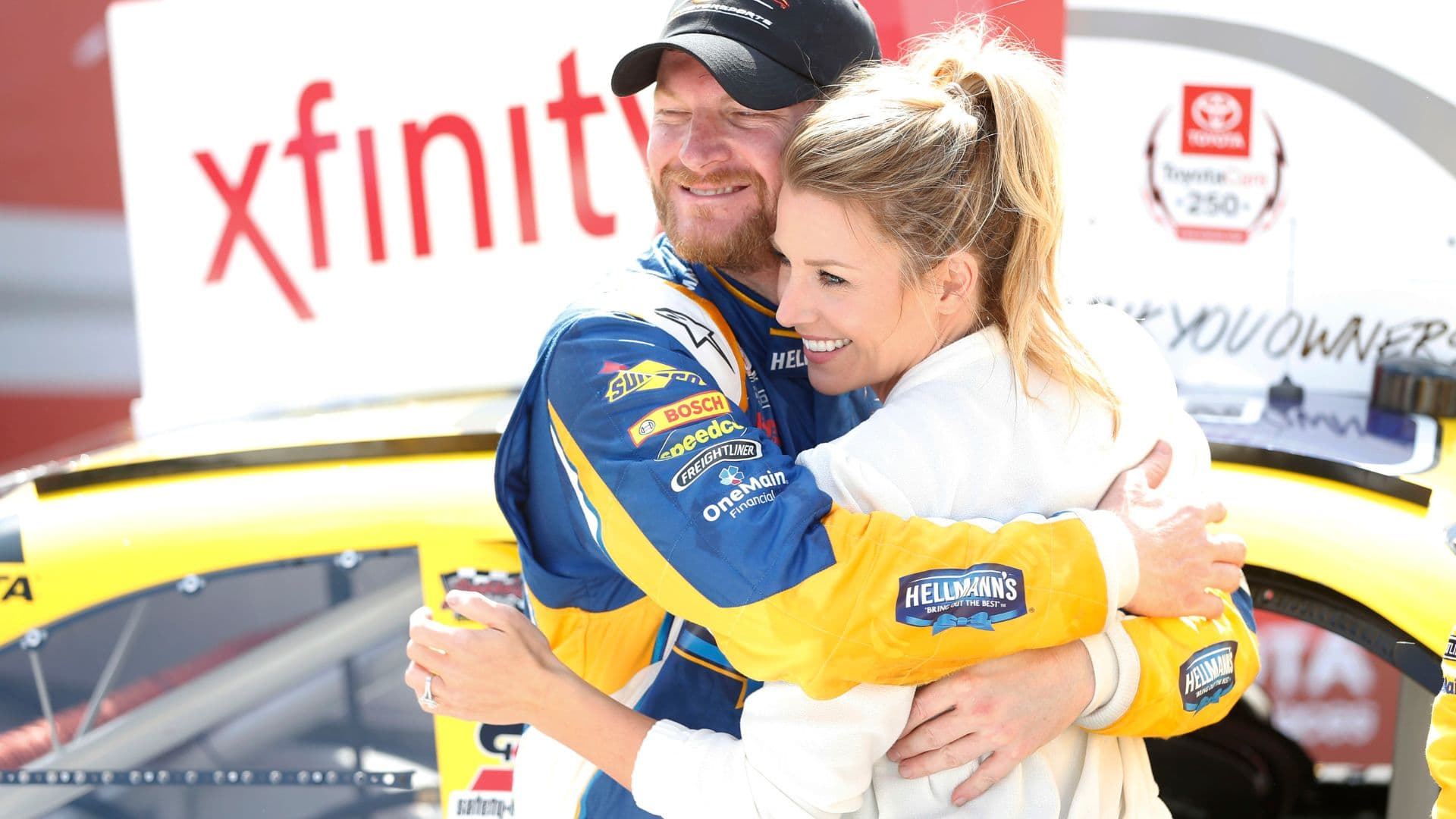 Apr 23, 2016; Richmond, VA, USA; Xfinity Series driver Dale Earnhardt Jr. (88) celebrates with his fianc Amy Reimann in Victory Lane after winning the Toyotacare 250 at Richmond International Raceway.