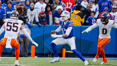 Buffalo Bills quarterback Josh Allen (17) scrambles avoiding Denver Broncos linebacker Cody Barton (55) and Denver Broncos linebacker Jonathon Cooper (0) and funs for a few yards before sliding down during the second half of the Buffalo Bills wild card game against the Denver Broncos at Highmark Stadium in Orchard Park on Jan. 12, 2025.