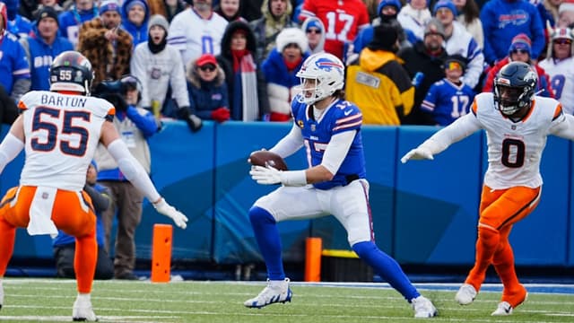 Buffalo Bills quarterback Josh Allen (17) scrambles avoiding Denver Broncos linebacker Cody Barton (55) and Denver Broncos linebacker Jonathon Cooper (0) and funs for a few yards before sliding down during the second half of the Buffalo Bills wild card game against the Denver Broncos at Highmark Stadium in Orchard Park on Jan. 12, 2025.