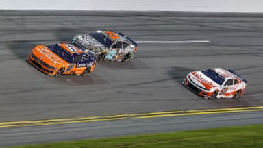 Aug 23, 2025; Daytona Beach, Florida, USA; NASCAR drivers race during the Coke Zero Sugar 400 at Daytona International Speedway.