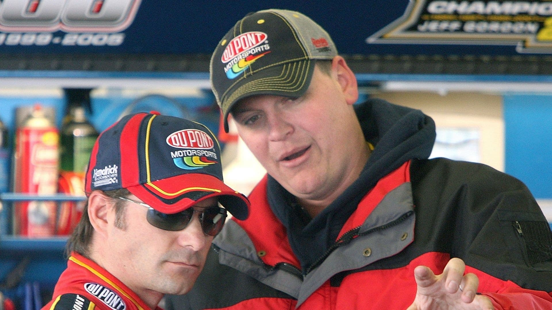 Jeff Gordon (left) and his crew chief Steve Letarte talk in the garage during Nextel Cup series practice at Daytona International Speedway in Daytona Beach, Florida, Friday, February 16, 2007