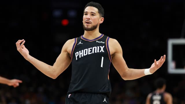 Phoenix Suns guard Devin Booker (1) reacts against the Oklahoma City Thunder in the first half at Mortgage Matchup Center