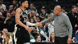 Apr 27, 2025; Milwaukee, Wisconsin, USA; Milwaukee Bucks forward Giannis Antetokounmpo (34) exits the game in the fourth quarter as head coach Doc Rivers shakes his hand during game four against the Indiana Pacers of first round for the 2024 NBA Playoffs at Fiserv Forum.
