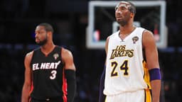 March 4, 2012; Los Angeles, CA, USA; Los Angeles Lakers shooting guard Kobe Bryant (24) and Miami Heat shooting guard Dwyane Wade (3) during a stoppage in play in the first half at Staples Center