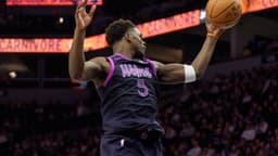 Jan 25, 2026; Minneapolis, Minnesota, USA; Minnesota Timberwolves guard Anthony Edwards (5) secures a rebound in the fourth quarter against the Golden State Warriors at Target Center.