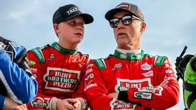 Former NASCAR Cup Series champion Kevin Harvick, center, right, and his son Keelan, 13, look on before the two raced in the 13th annual Masters of the Pros 200 race on Wednesday, July 16, 2025, at the Owosso Speedway.