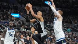 Jan 17, 2026; San Antonio, Texas, USA; San Antonio Spurs forward Victor Wembanyama (1) goes up for a shot in front of Minnesota Timberwolves guard Donte DiVincenzo (0) in the second half at Frost Bank Center