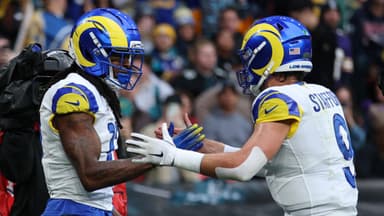London, United Kingdom; Los Angeles Rams wide receiver Davante Adams (17) celebrates with quarterback Matthew Stafford (9) after scoring a touchdown against the Jacksonville Jaguars during the first half during a NFL International Series game at Wembley Stadium.