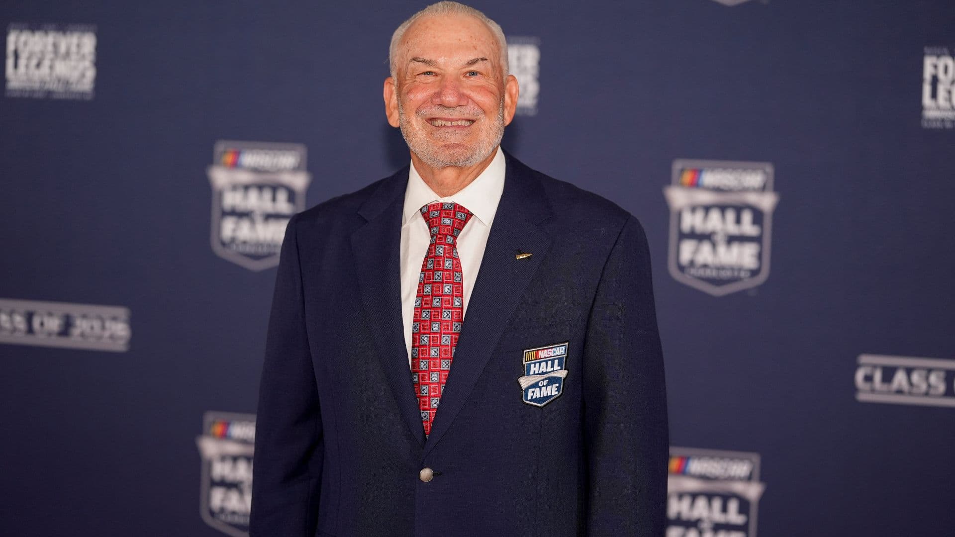 Jan 23, 2026; Charlotte, NC, USA; Dale Jarrett poses on the red carpet during the NASCAR Hall of Fame Induction at Charlotte Convention Center - Crown Ballroom