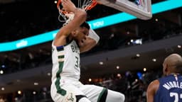 Milwaukee Bucks forward Giannis Antetokounmpo (34) reacts following a dunk during the first quarter against the Washington Wizards at Fiserv Forum