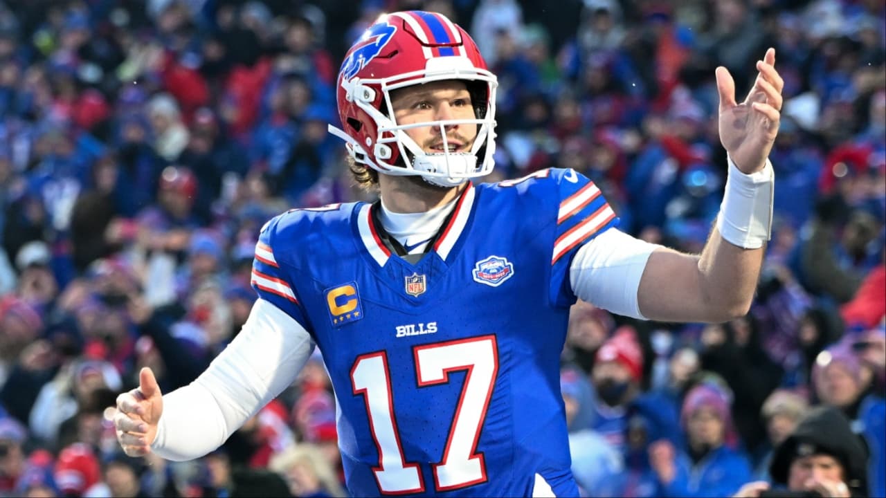 Buffalo Bills quarterback Josh Allen (17) runs onto the field before the game against the New York Jets at Highmark Stadium.