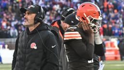 Cleveland Browns head coach Kevin Stefanski and quarterback Shedeur Sanders (12) on the sidelines against the Buffalo Bills during the second half at Huntington Bank Field.