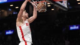 Jan 1, 2026; Brooklyn, New York, USA; Houston Rockets center Alperen Sengun (28) dunks the ball during the second half against the Brooklyn Nets at Barclays Center