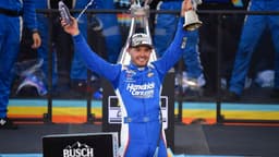 Nov 2, 2025; Avondale, Arizona, USA; NASCAR Cup Series driver Kyle Larson (5) celebrates his championship victory following the Cup Series Championship race at Phoenix Raceway