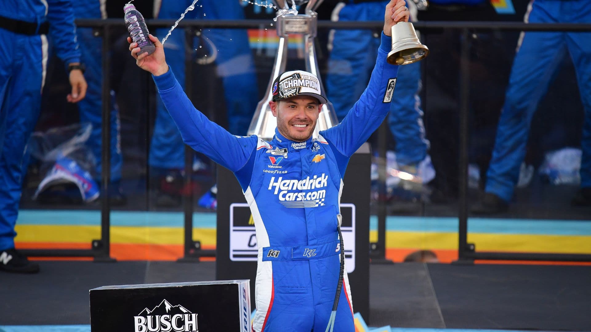 Nov 2, 2025; Avondale, Arizona, USA; NASCAR Cup Series driver Kyle Larson (5) celebrates his championship victory following the Cup Series Championship race at Phoenix Raceway