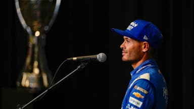 Aug 27, 2025; Charlotte, NC, USA; Kyle Larson answers questions from the media during NASCAR Cup Series Playoff Media Day at Charlotte Convention Center.