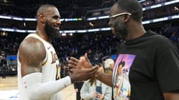 Jan 25, 2025; San Francisco, California, USA; Los Angeles Lakers forward LeBron James (left) talks with Golden State Warriors forward Draymond Green (right) after the game at Chase Center.
