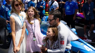 May 29, 2022; Indianapolis, Indiana, USA; IndyCar Series driver Jimmie Johnson with wife Chandra Johnson and their daughters prior to the running of the 106th Indianapolis 500 at Indianapolis Motor Speedway