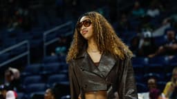 Sep 11, 2025; Chicago, Illinois, USA; Injured Chicago Sky forward Angel Reese (5) stands on the sidelines before a WNBA game against the New York Liberty at Wintrust Arena.