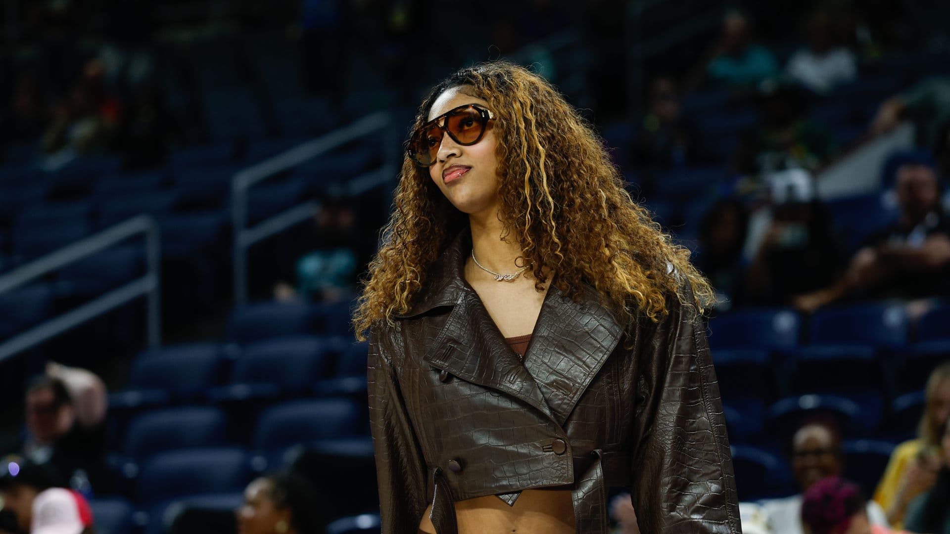 Sep 11, 2025; Chicago, Illinois, USA; Injured Chicago Sky forward Angel Reese (5) stands on the sidelines before a WNBA game against the New York Liberty at Wintrust Arena.