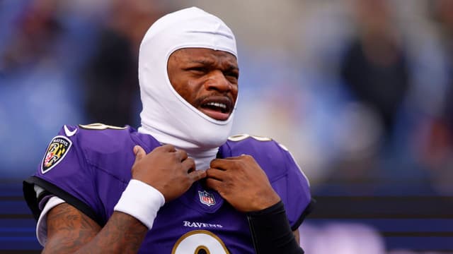 Baltimore Ravens quarterback Lamar Jackson (8) looks on during warmups before the game between the Pittsburgh Steelers and Baltimore Ravens at M&T Bank Stadium.