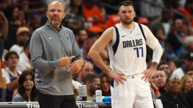 Oct 26, 2024; Phoenix, Arizona, USA; Dallas Mavericks head coach Jason Kidd with guard Luka Doncic (77) against the Phoenix Suns in the first half at Footprint Center