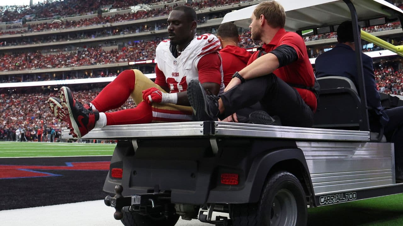 San Francisco 49ers defensive tackle Sam Okuayinonu (91) is driven in a cart after an apparent injury during the fourth quarter against the Houston Texans at NRG Stadium.