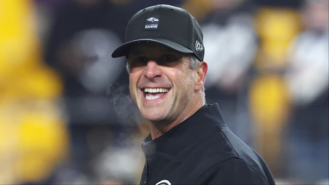Baltimore Ravens head coach John Harbaugh reacts on the field before the game against the Pittsburgh Steelers at Acrisure Stadium.