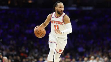 Jan 24, 2026; Philadelphia, Pennsylvania, USA; New York Knicks guard Jalen Brunson (11) dribbles the ball against the Philadelphia 76ers during the first quarter at Xfinity Mobile Arena.