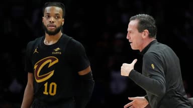 Jan 8, 2026; Minneapolis, Minnesota, USA; Cleveland Cavaliers head coach Kenny Atkinson directs guard Darius Garland (10) and the team as they play the Minnesota Timberwolves in the fourth quarter at Target Center.