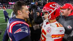 New England Patriots quarterback Tom Brady (12) and Kansas City Chiefs quarterback Patrick Mahomes (15) after the game at Gillette Stadium.
