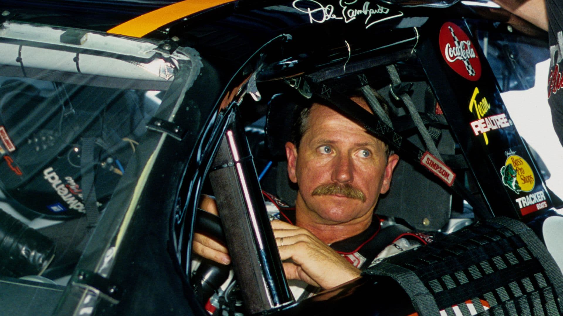 Daytona Beach, FL, USA: FILE PHOTO; NASCAR Winston Cup Series driver Dale Earnhardt Sr (3) waits in his car in the garage area at the Daytona International Speedway.