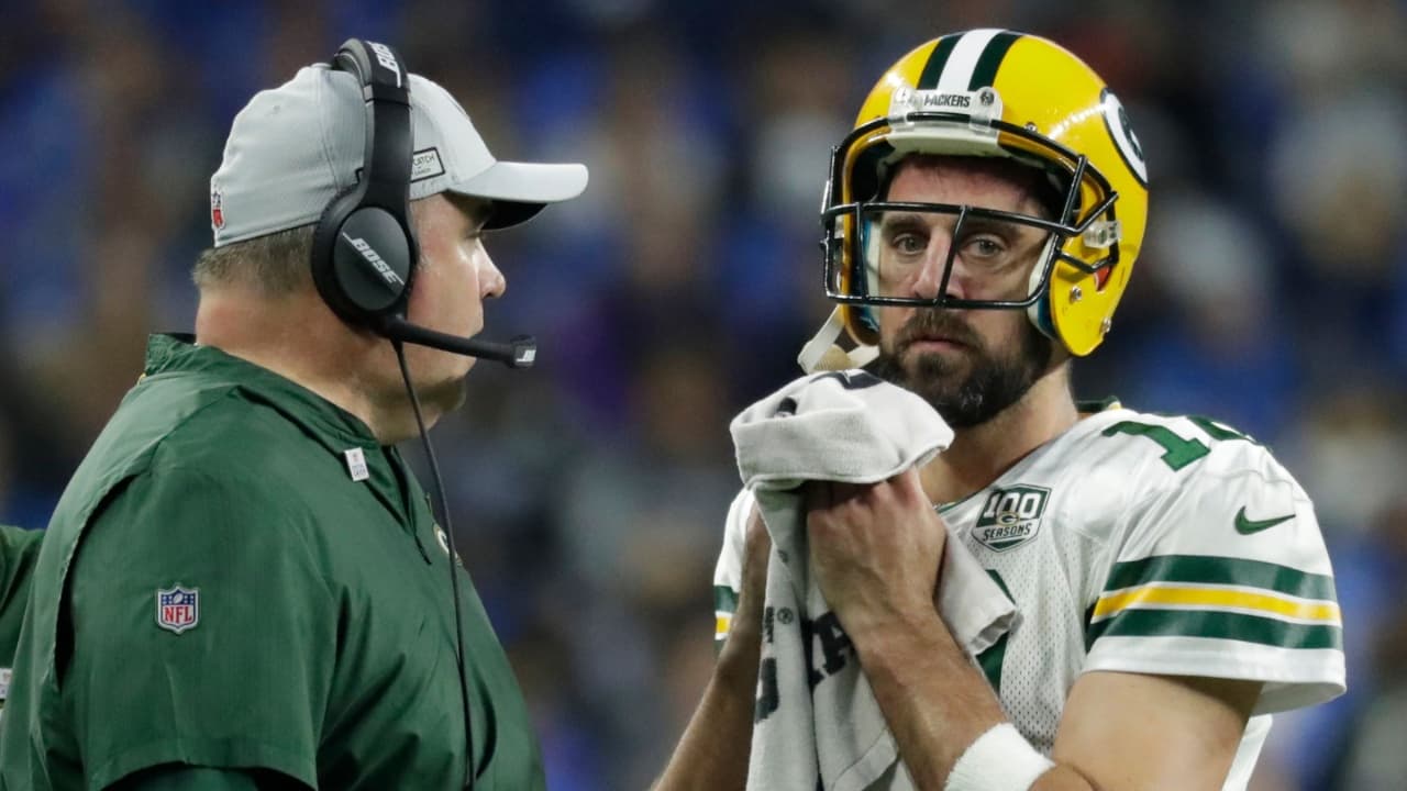 Coach Mike McCarthy talks with Green Bay Packers quarterback Aaron Rodgers during a break in the second half during the Green Bay Packers 31-23 loss to the Detroit Lions at Ford Field. Packlions 32ofx Wood