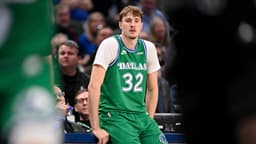 Jan 12, 2026; Dallas, Texas, USA; Dallas Mavericks forward Cooper Flagg (32) looks on during the second half against the Brooklyn Nets at the American Airlines Center