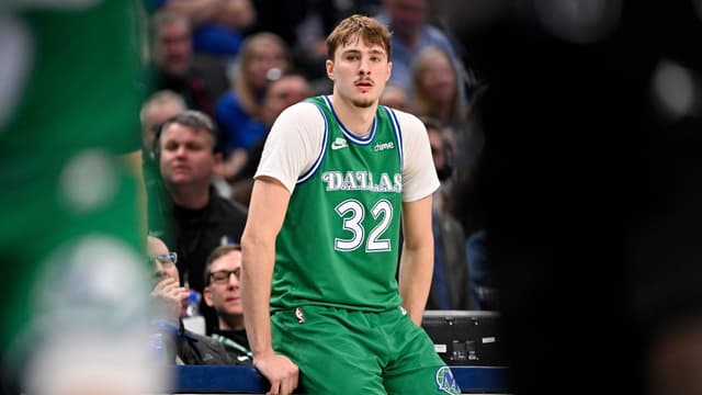 Jan 12, 2026; Dallas, Texas, USA; Dallas Mavericks forward Cooper Flagg (32) looks on during the second half against the Brooklyn Nets at the American Airlines Center