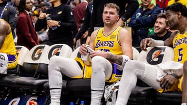 Los Angeles Lakers forward/guard Luka Doncic (77) sits on a the bench against the New Orleans Pelicans during the second half at Smoothie King Center