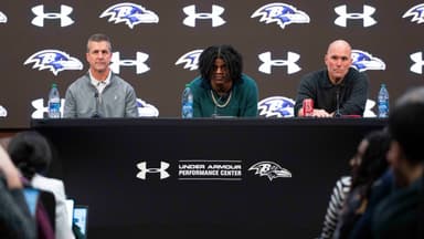 Baltimore Ravens head coach John Harbaugh, quarterback Lamar Jackson, and general manager Eric DeCosta listen to a question asked at a press conference at Under Armour Performance Center.