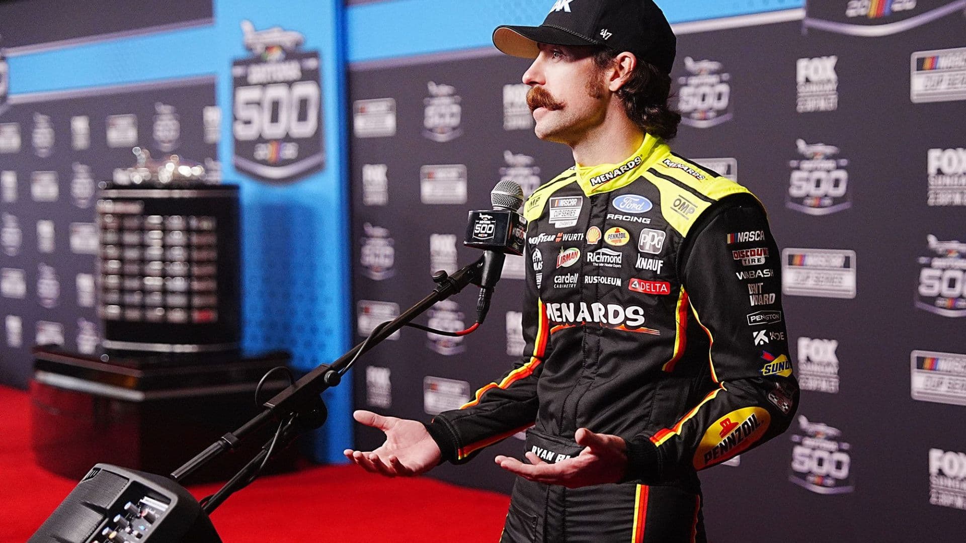 Ryan Blaney speaks to media during NASCAR Media Day at Daytona International Speedway, Wednesday, Feb. 11, 2026