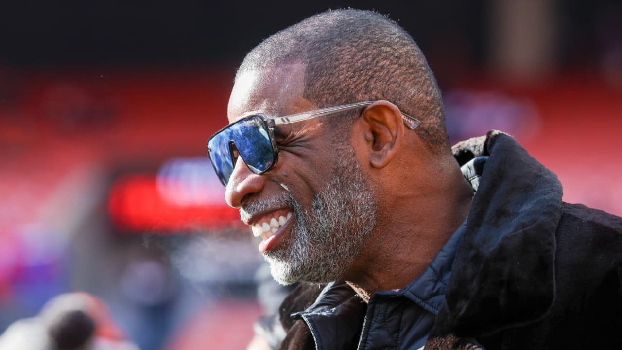 Legendary football and baseball player and father of Cleveland Browns quarterback Shedeur Sanders, Deion Sanders on the sidelines prior to a game against the Buffalo Bills at Huntington Bank Field.
