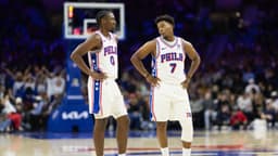 Philadelphia 76ers guard Tyrese Maxey (0) talks with guard Kyle Lowry (7) during the third quarter against the Memphis Grizzlies at Wells Fargo Center.